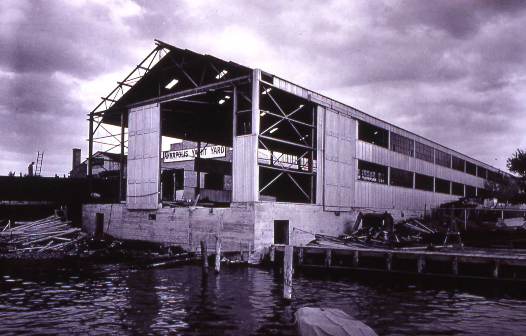 Construction photo of "The Big Shed" - a large structure created circa 1942 to house boat building for the World Wars PT boats and Trumpy Yachts in Annapolis.